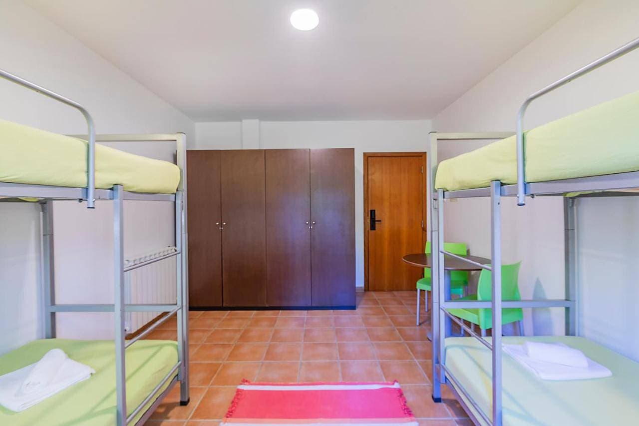 Foto 9 von 11: Quadruple Room with Shared Bathroom