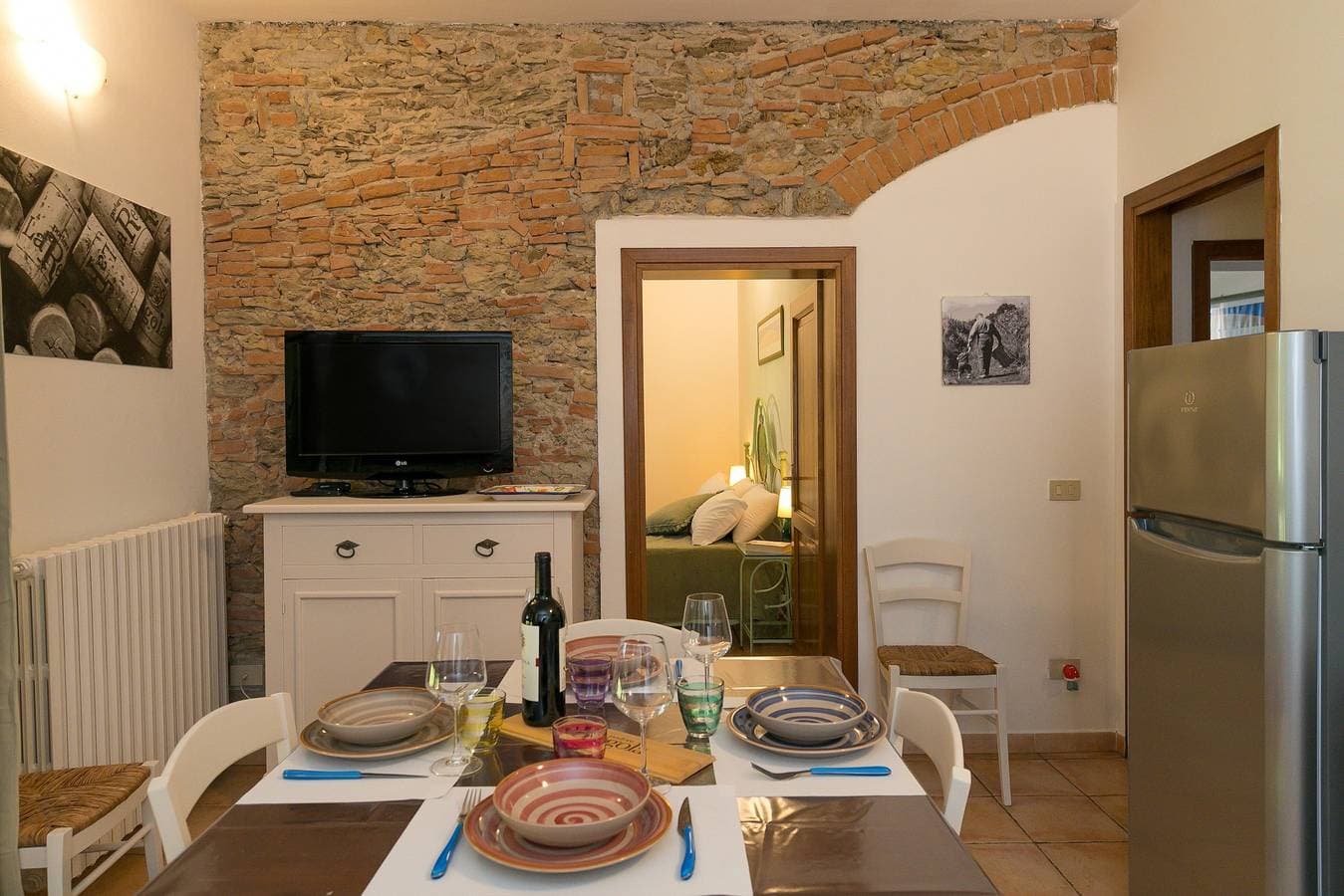 Foto 6 von 29: Podere Nuti – 1 La Regola: Überdachte Terrasse, Pool & Garten, privater Parkplatz