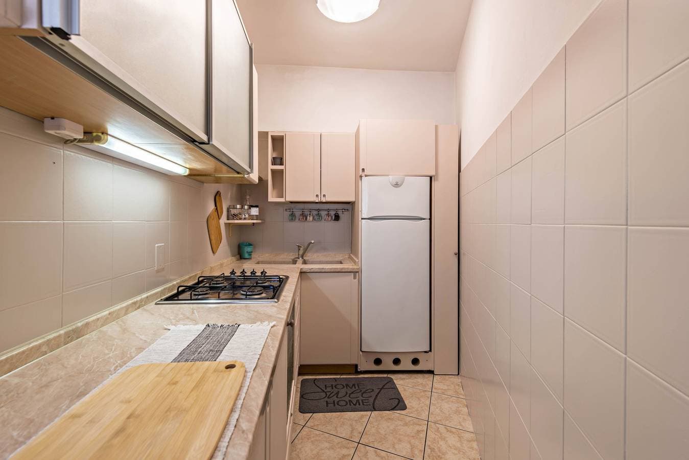 Foto 8 von 29: Schöne Ferienwohnung "Lola Home Brenzone" mit Blick auf den See und die Berge