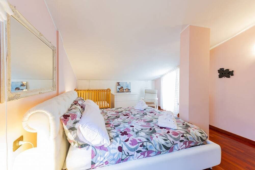 Foto 3 von 30: GuestHost - Nice 80 sqm apartment on two levels, perfect for 2 people, located on the first floor of a semi-detached house Without a lift (stairs to access it). The accommodation is located in San Martino, a quiet and peaceful neighborhood where you can