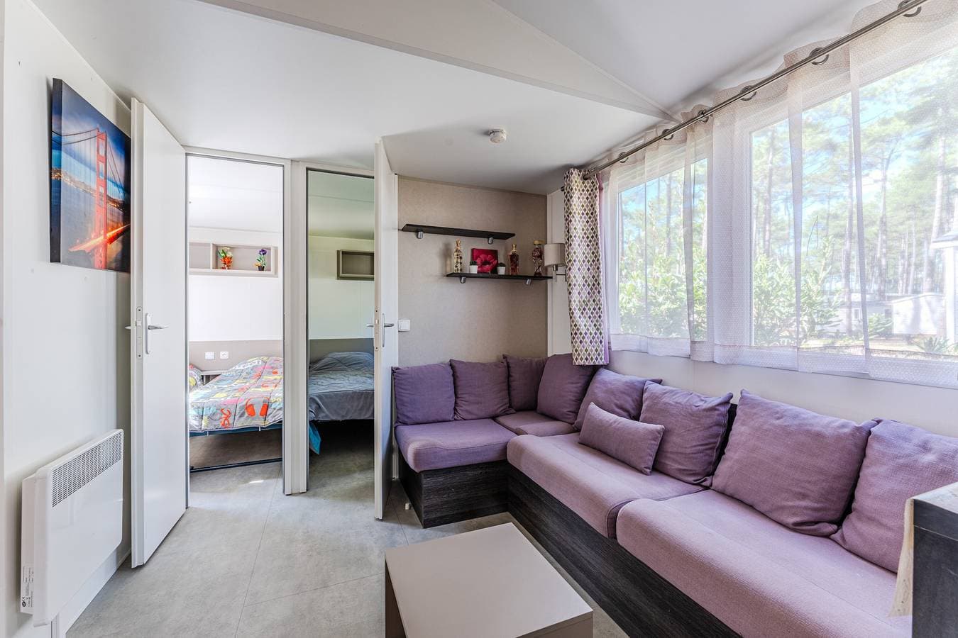 Foto 8 von 25: Mobilheim 'Les Dunes De Contis' mit Gemeinschaftspool, privater Terrasse und Klimaanlage