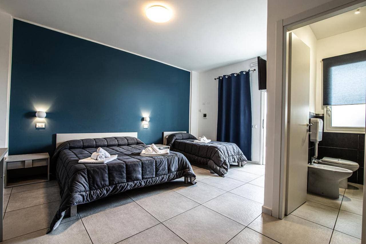 Foto 8 von 17: Triple Room with Garden View