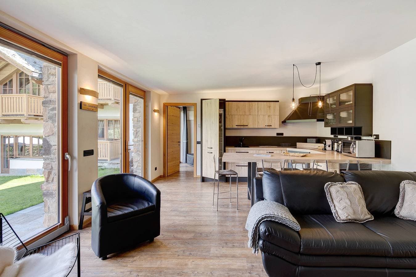 Foto 5 von 29: Ferienwohnung Chalet Monteneve Neve mit Bergblick, Gemeinschaftsgarten und WLAN