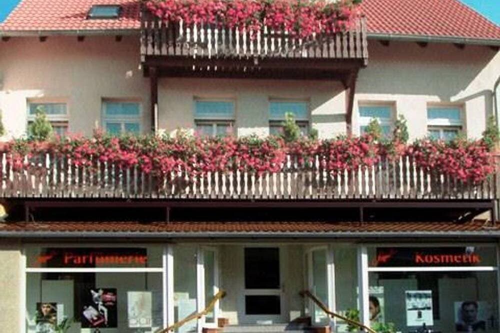 Foto 4 von 8: Appartement 4 - Balkon, 2. Etage - Pension Schröder