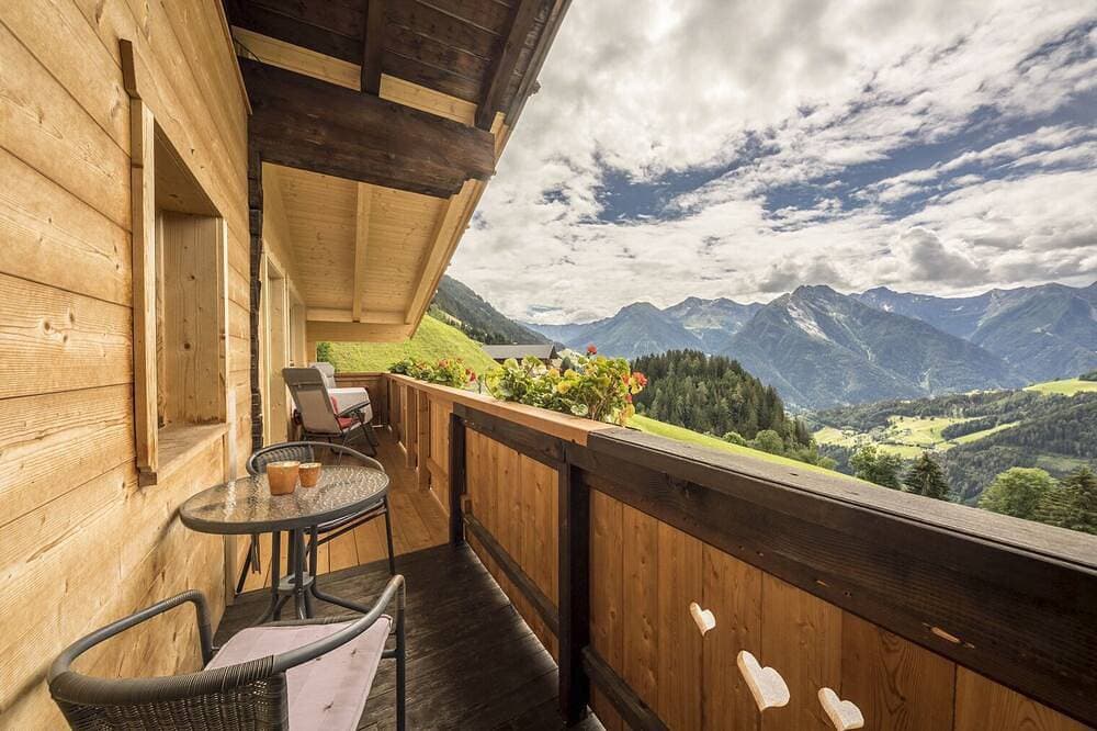 Foto 8 von 11: Ferienwohnungen mit Panoramablick auf die Berge