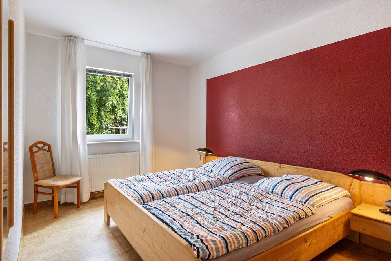 Foto 2 von 18: Ferienwohnung mit Gemeinschaftsgarten und WLAN
