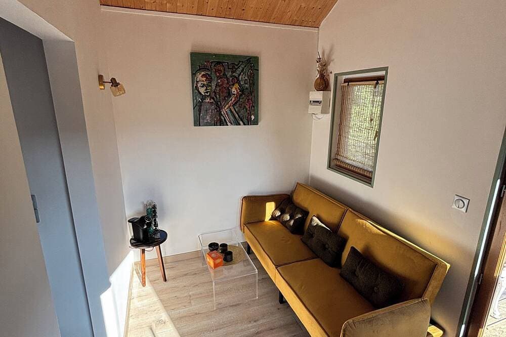 Foto 13 von 15: A cottage in an orchard