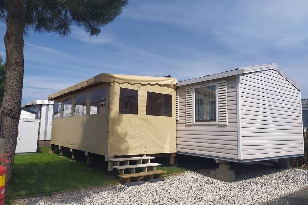Foto 8 von 16: Mobil-home Dans Camping Calme Avec Piscine, 2,8 km de la Plage