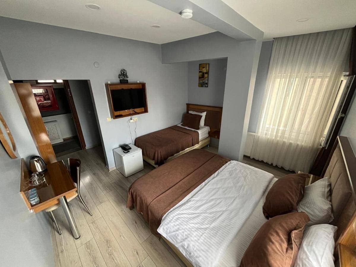Foto 3 von 13: Basic Triple Room