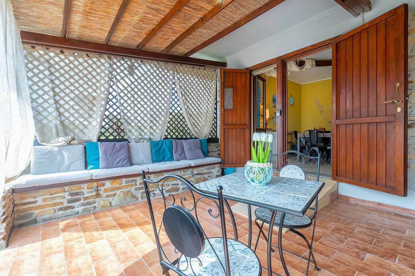 Foto 4 von 33: Ferienhaus 'Fiamma' mit Meerblick, privater Terrasse und Klimaanlage