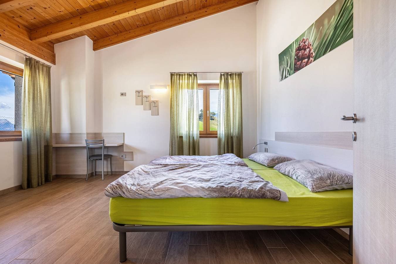 Foto 12 von 35: Ferienwohnung Bocca Nevese Pino mit Seeblick, Garten & WLAN