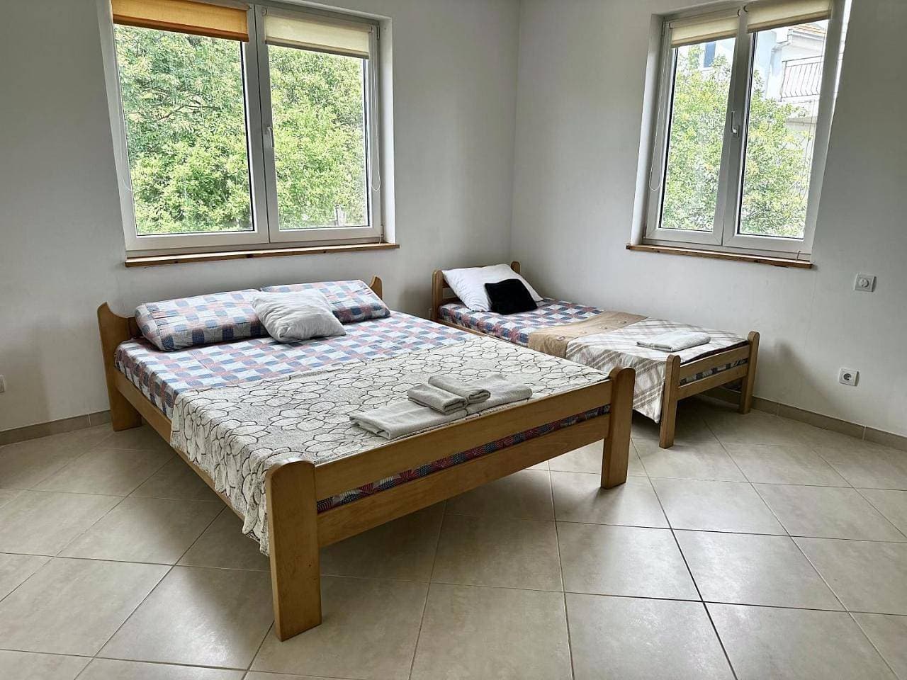 Foto 12 von 13: Triple Room with Garden View