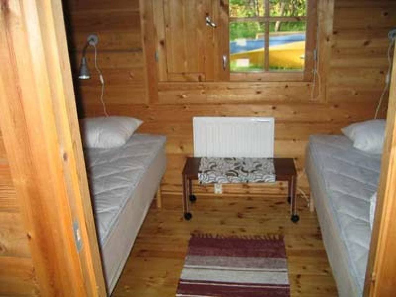 Foto 6 von 11: Gemütlich rustikales Ferienhaus mit Seeblick