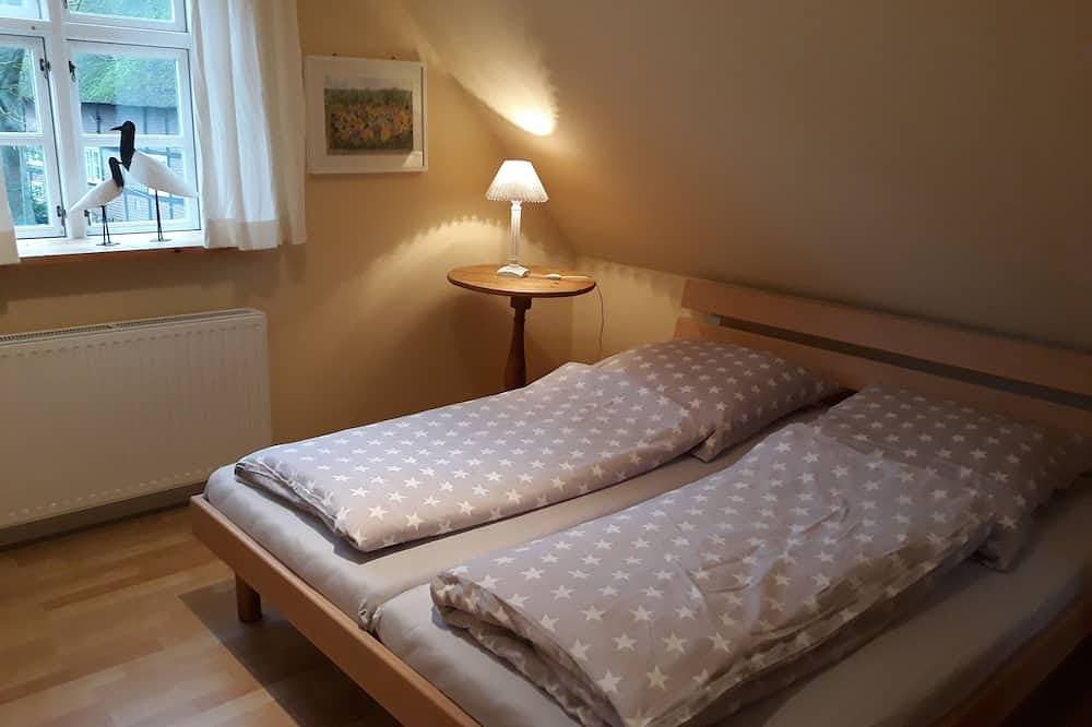 Foto 2 von 11: Cozy living under thatch