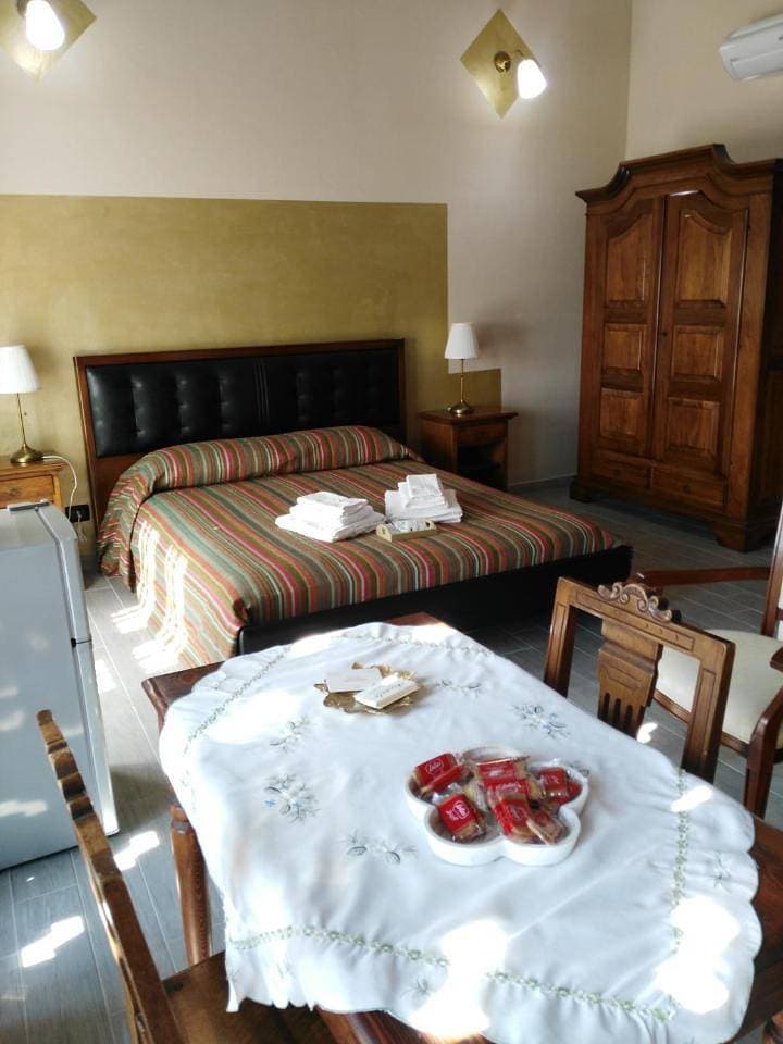 Foto 6 von 8: Triple Room with Private Bathroom