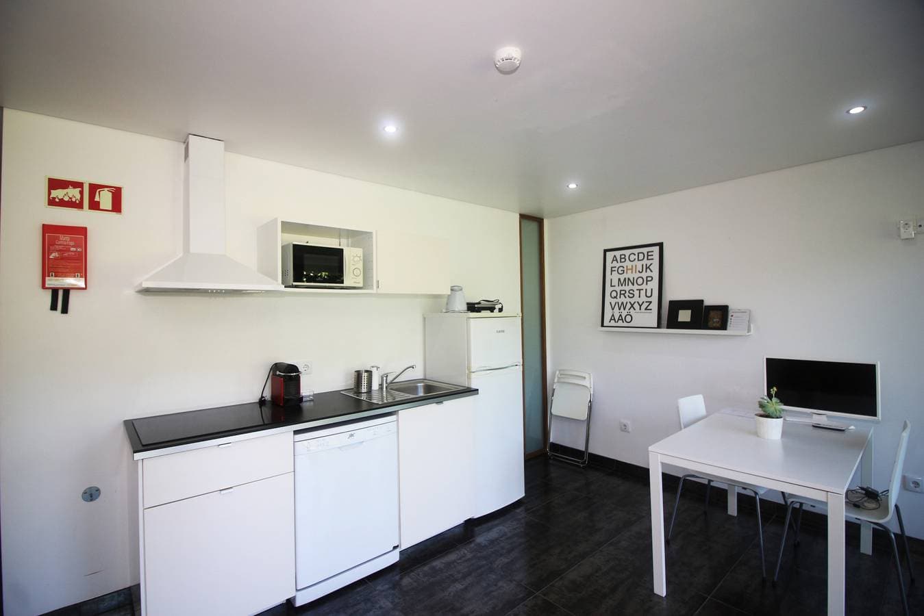 Foto 6 von 21: Apartamento Esquilo - Casas Barca do Rio - Gerês