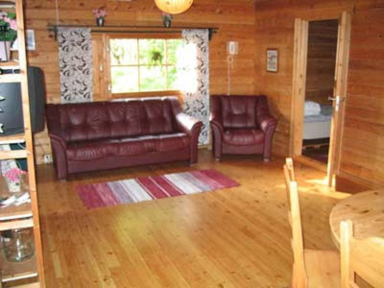 Foto 5 von 11: Gemütlich rustikales Ferienhaus mit Seeblick