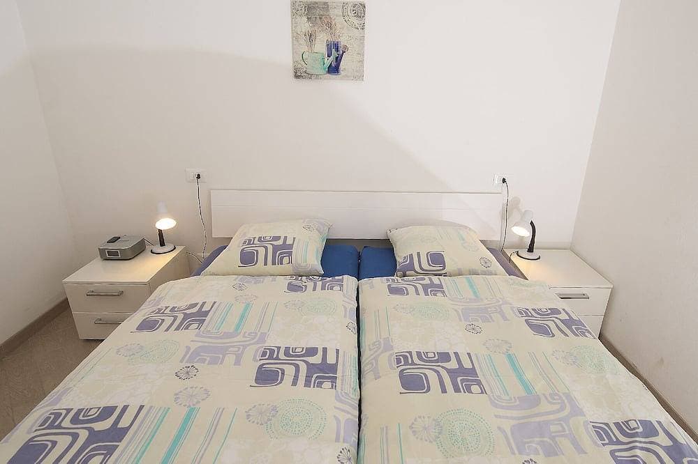 Foto 6 von 23: FeWo Farfalla mit Klima, Pool und Parkplatz mit Ladestation 22 kw, 250 Meter See