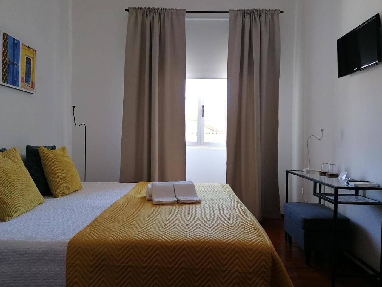 Foto 7 von 47: Double Room with Shared Bathroom