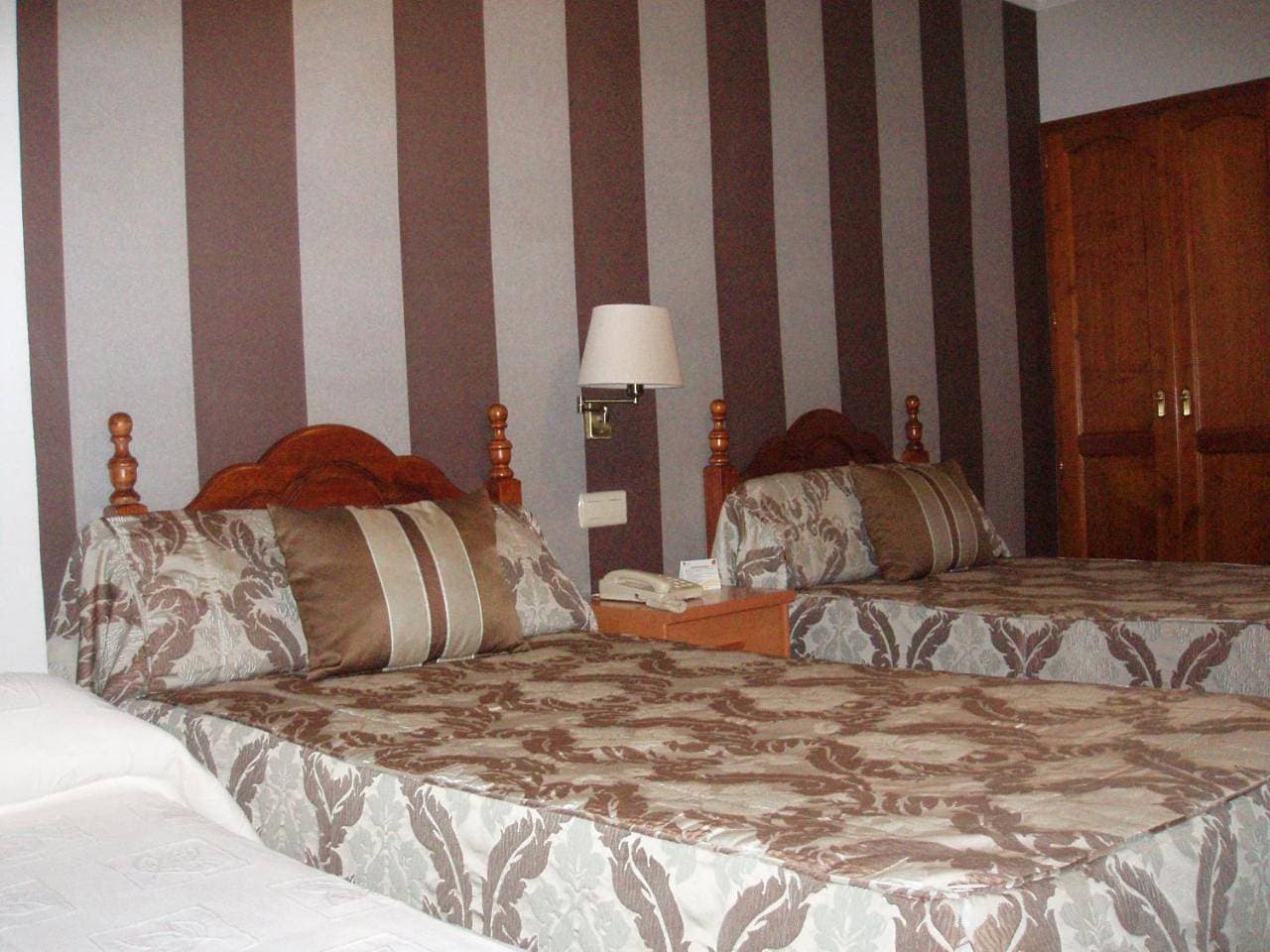 Foto 10 von 10: Triple Room