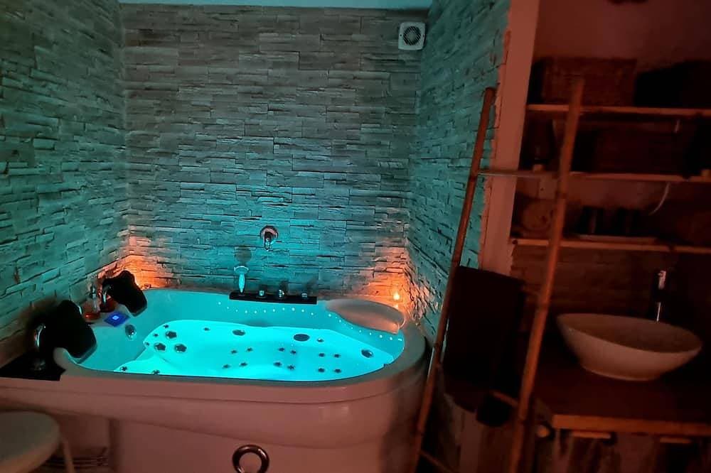 Foto 8 von 17: Suite with a private hot tub