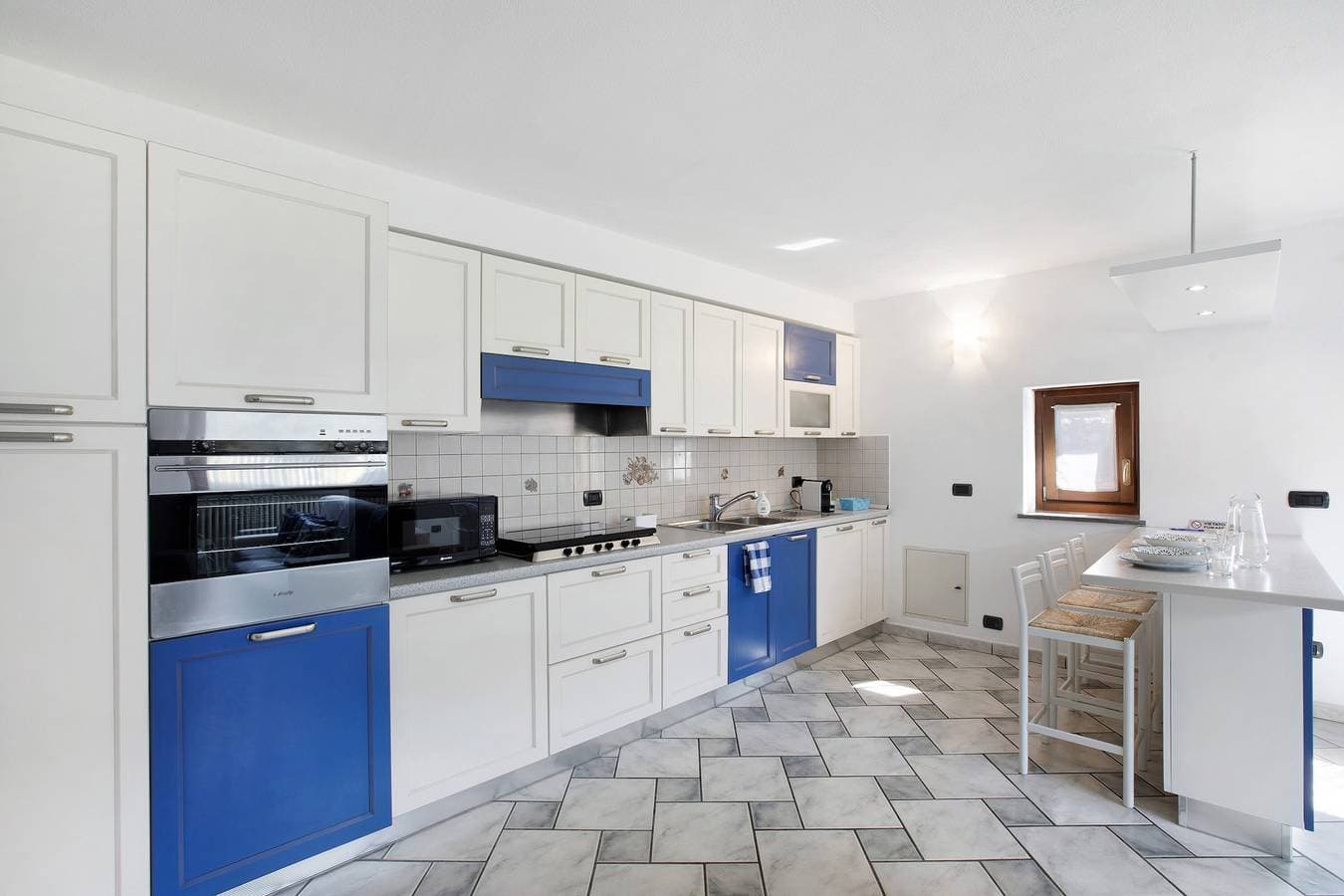 Foto 5 von 28: Apartment „Casa Sabrina - Blu“ mit Bergblick, privatem Garten und WLAN
