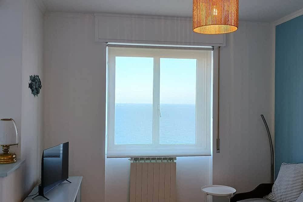 Foto 9 von 22: Spacious two-room apartment with sea view and air conditioning