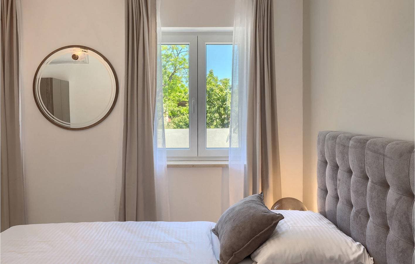 Foto 5 von 51: Gemütliche 2-Zimmer-Wohnung mit Pool, WLAN und Parkplatz in der Nähe des Restaurants Fiorini