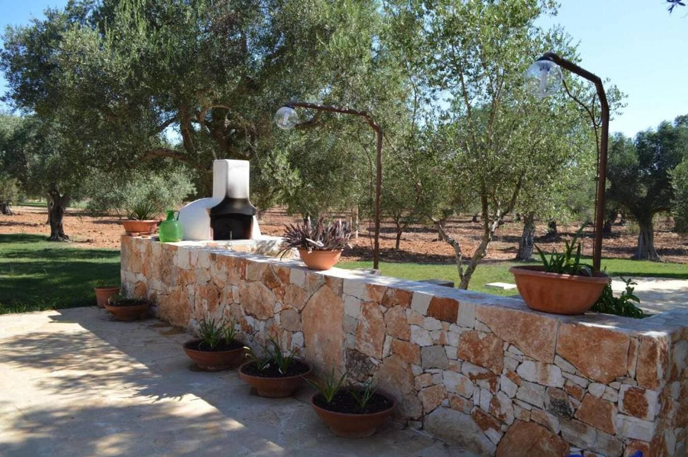 Foto 6 von 10: Villa 'Residenze Uliveto - 16' mit Gemeinschaftspool, privater Terrasse und Klimaanlage
