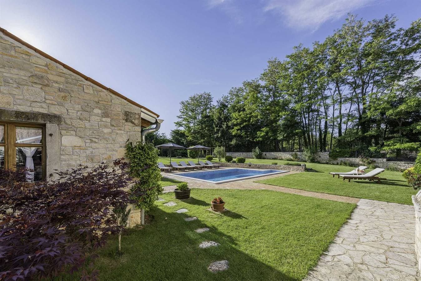 Foto 12 von 72: Ferienhaus Green Escape mit Pool