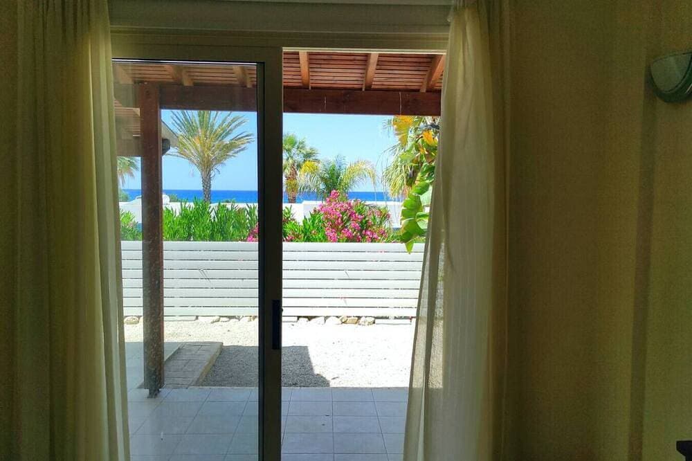 Foto 13 von 13: A charming bungalow with sea views and within 100 meter from the beach!