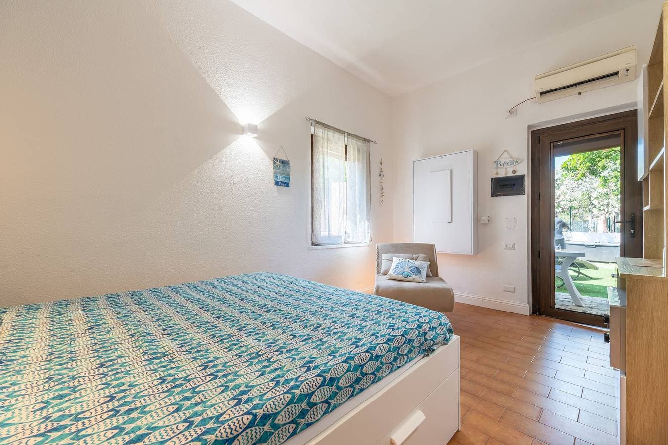 Foto 8 von 23: Ferienhaus 'Keka' mit privater Terrasse, Gemeinschaftsgarten und Klimaanlage