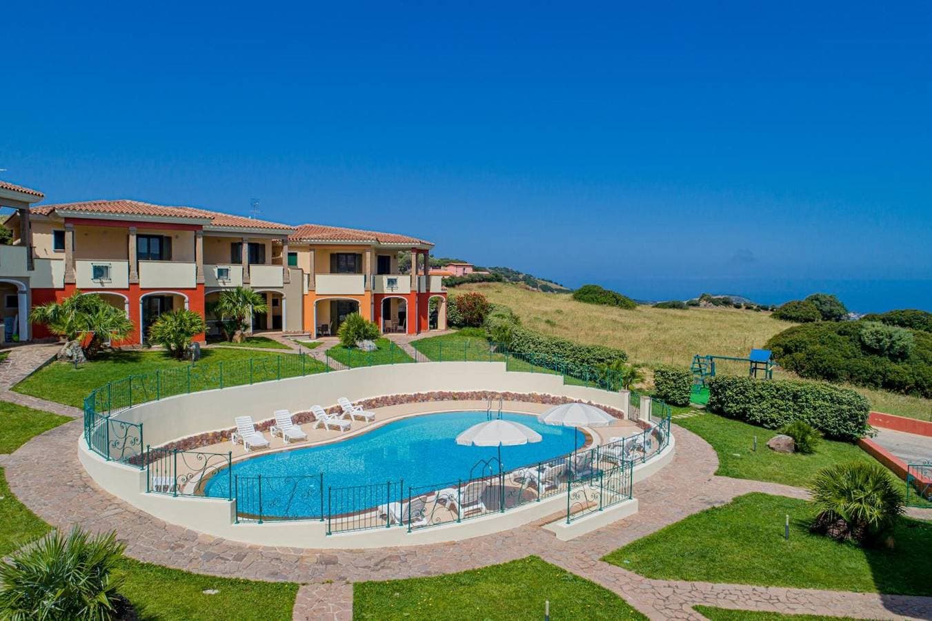 Foto 3 von 37: Residenza Le Farfalle 'A' mit Gartenblick, WLAN und Klimaanlage