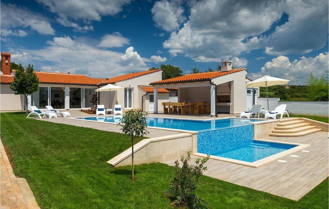 Foto 2 von 29: Three-Bedroom Holiday Home