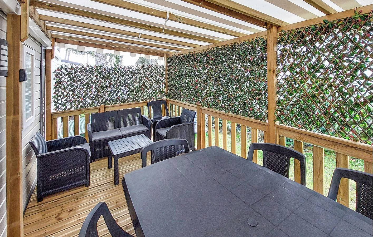 Foto 11 von 30: Gemütliches Mobilheim mit Parkplatz, WiFi, AC, Pool & Garten, Nähe Restaurant
