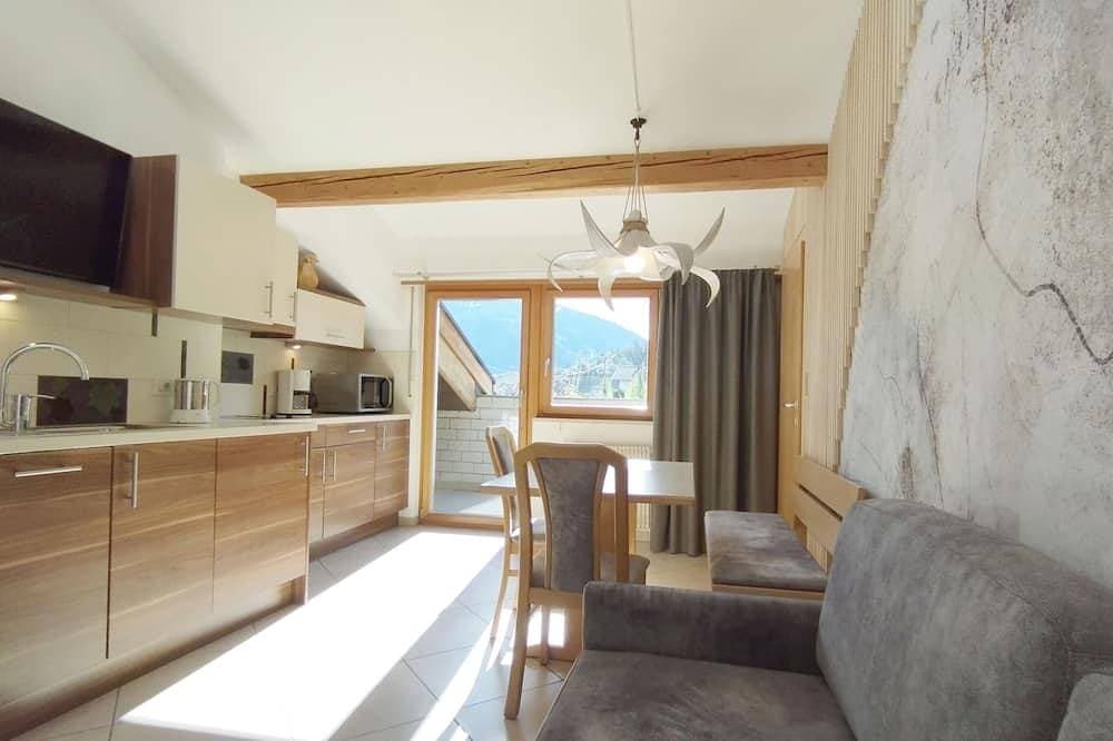 Ferienwohnung für 2-4 Personen mit Südwestloggia und biologischem Naturbadeteich 1