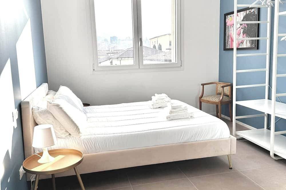 Foto 2 von 23: Jungle Sarnico Color Suites  -Garage - Self check - 2 min from the lake and downtown