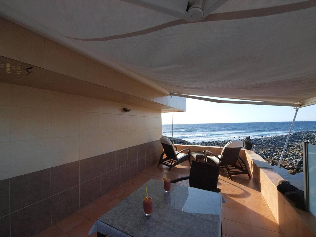 Foto 3 von 40: Ferienhaus 'Sunrise Direkt am Meer' mit Meerblick, Privater Terrasse und WLAN