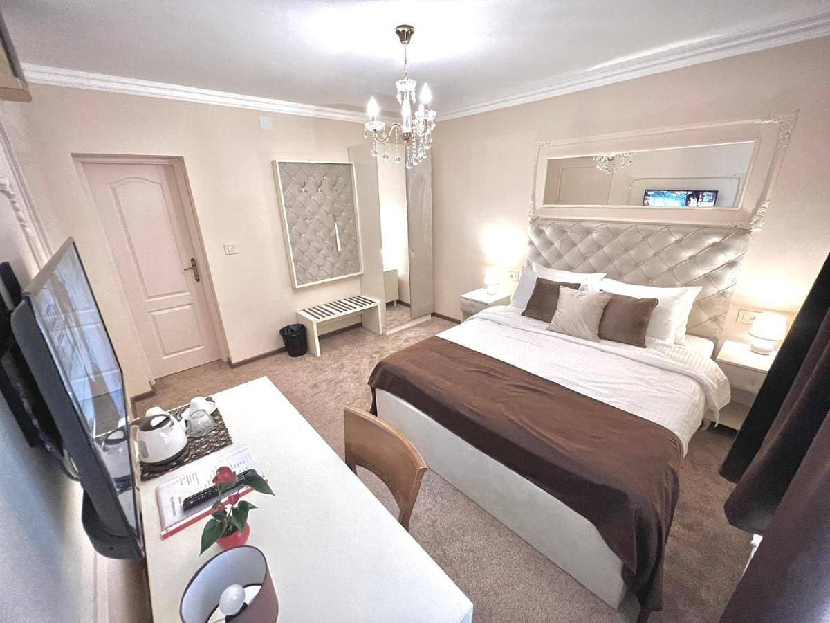 Foto 4 von 12: Twin Room with Private Bathroom