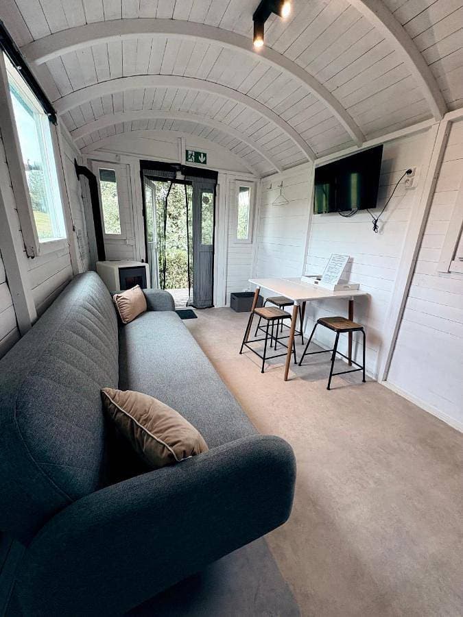 Foto 4 von 21: Triple Room with Garden View