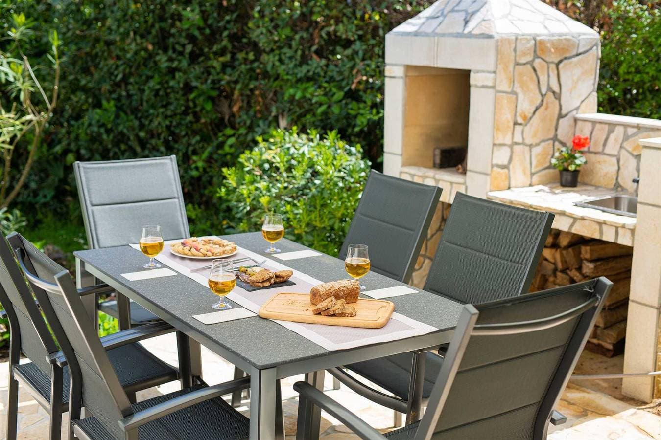 Foto 4 von 17: Ferienhaus Memento mit Garten