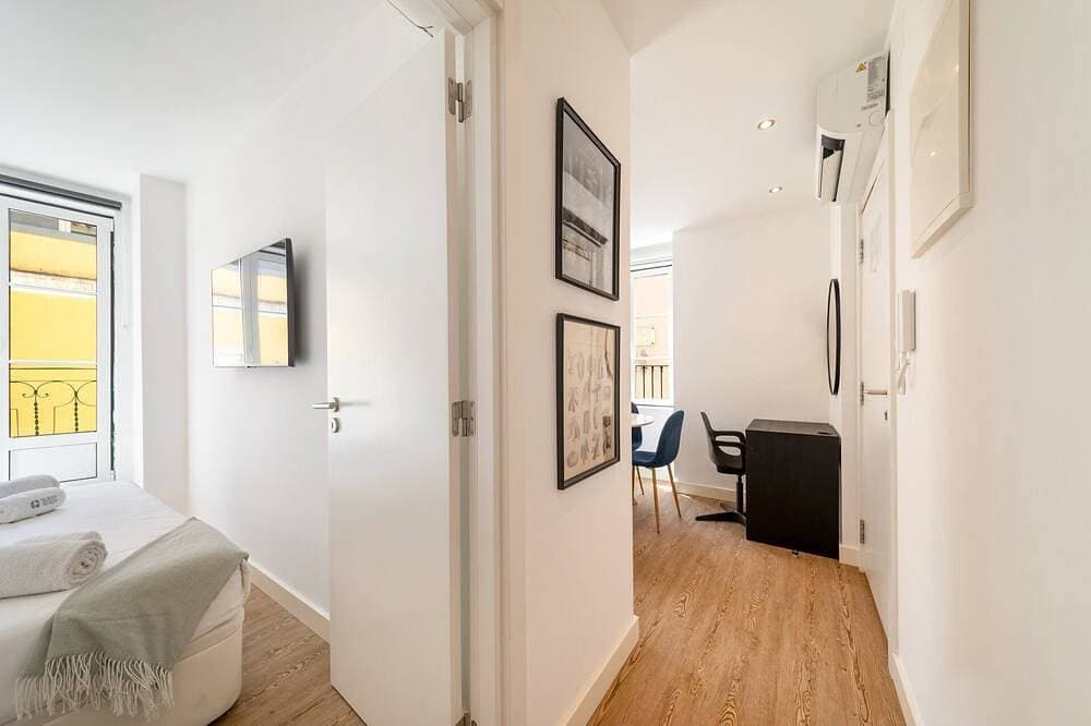 Foto 6 von 26: GuestReady - Carolina Building: Erdgeschoss Rechts