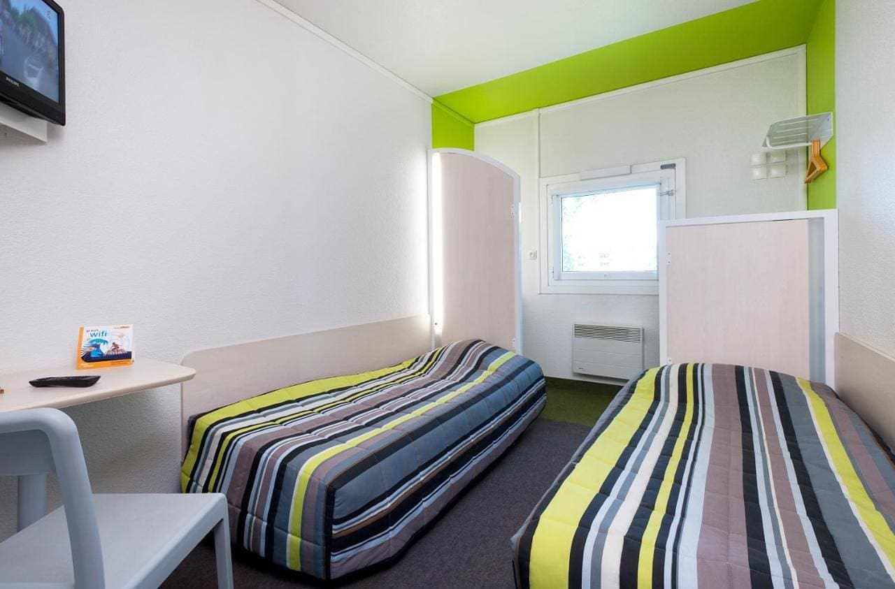Foto 9 von 13: Twin Room with Shared Bathroom