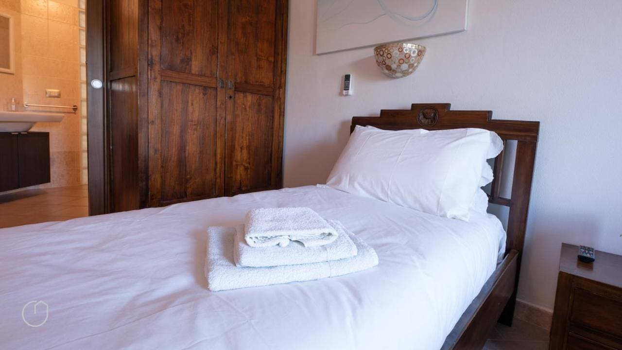 Foto 7 von 24: Triple Room with Private Bathroom