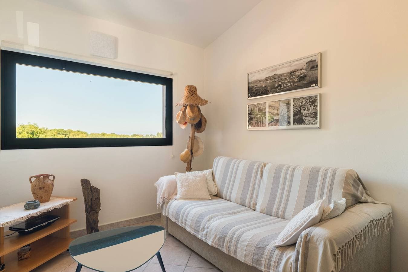 Foto 2 von 28: Ferienhaus 'Villa De La Torré Di Bari Sardo' mit Meerblick, privater Terrasse & Klimaanlage