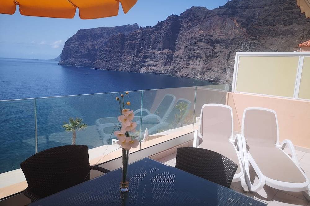 Spektakuläre sonnige Wohnung mit WIFI, Pool, Panoramablick Cliff & Meerblick. 1
