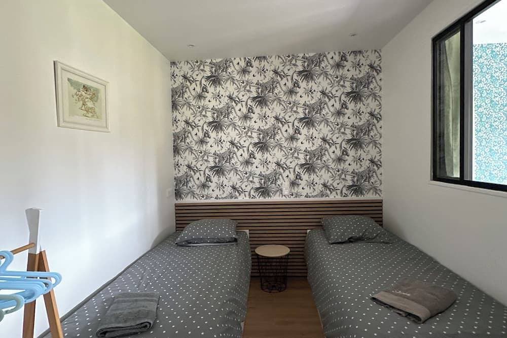 Foto 7 von 28: Listed 3-star ⭐️⭐️⭐️ beachfront home with 3 bedrooms, a garden, and private parking.