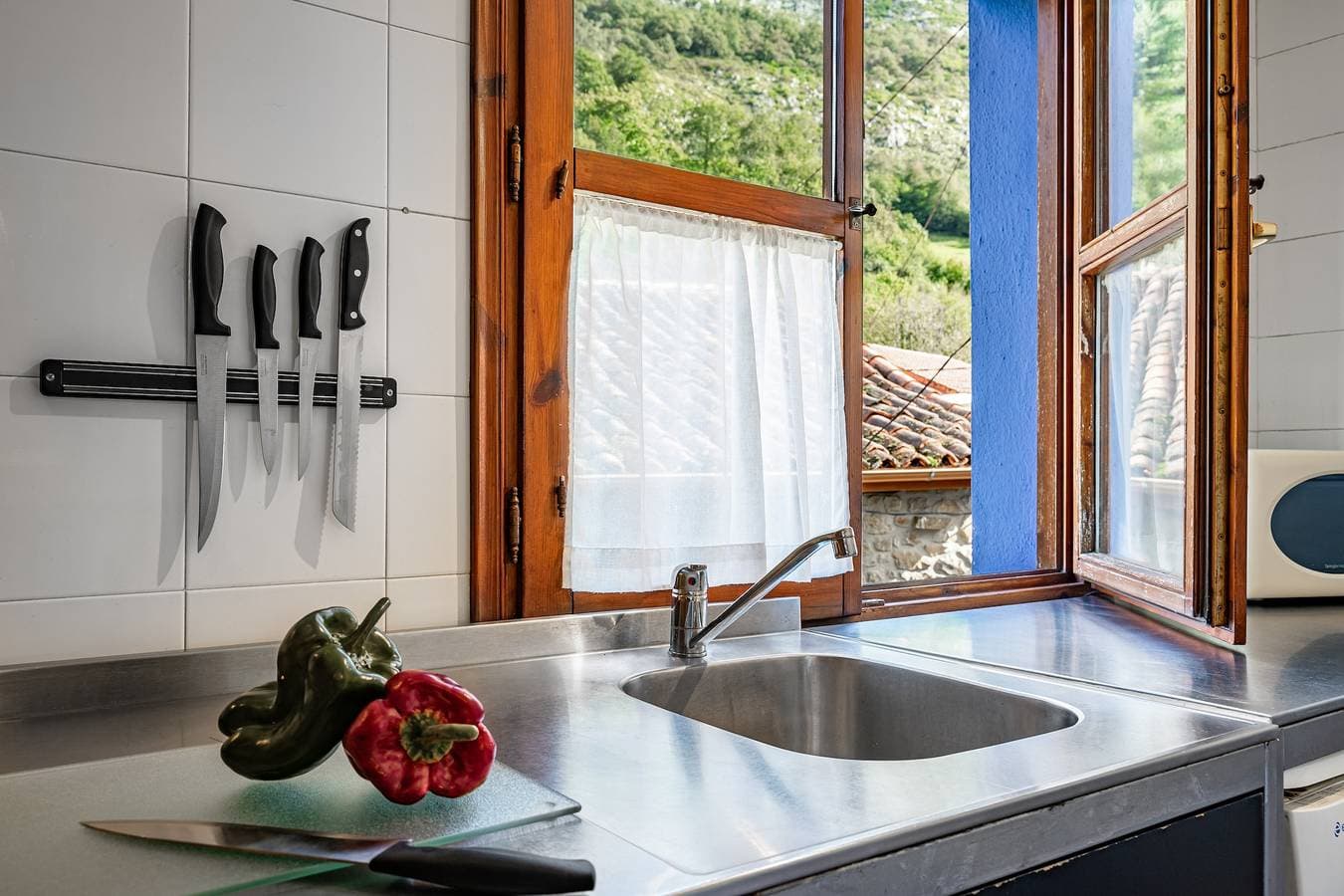 Foto 7 von 44: Ferienhaus mit Whirlpool und Bergblick im Naturpark Ponga