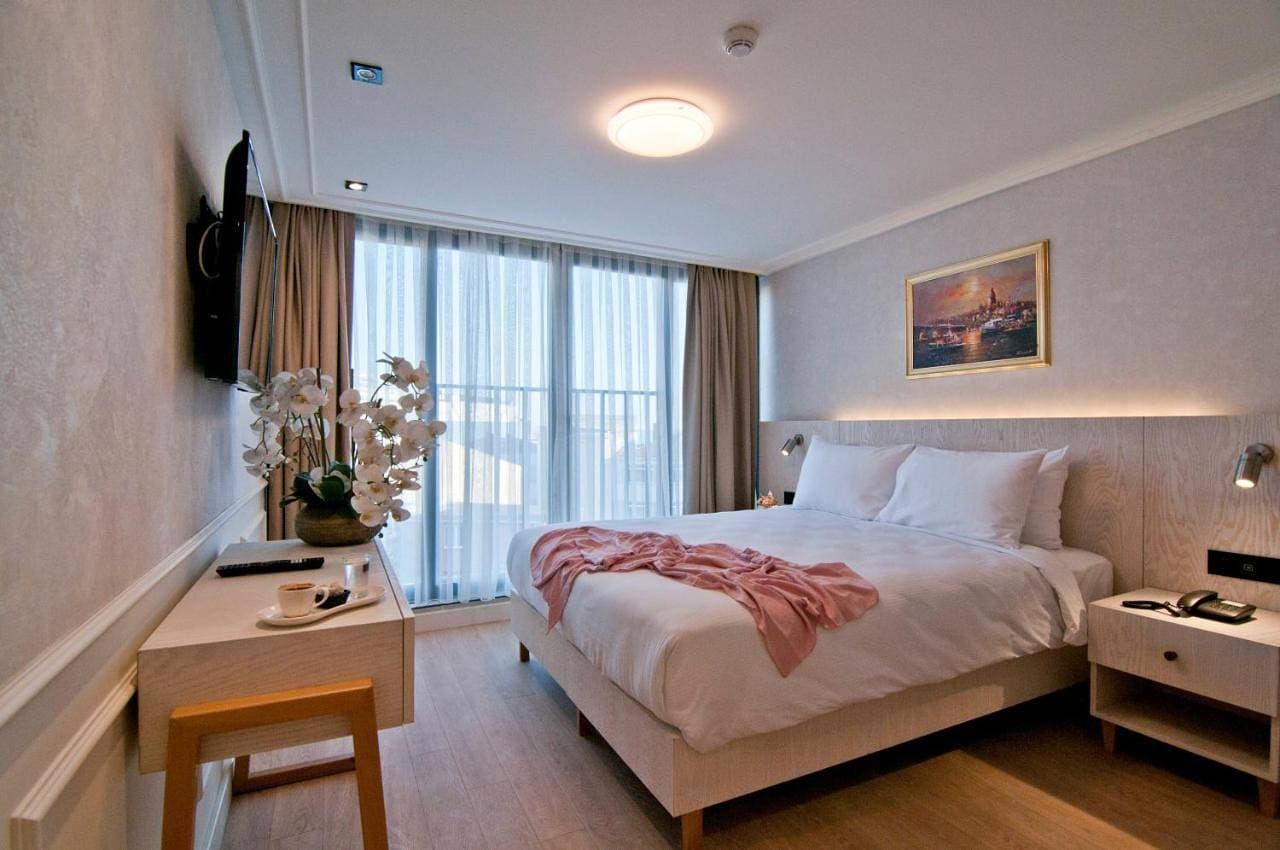 Foto 2 von 27: Deluxe Double Room with Side Sea View