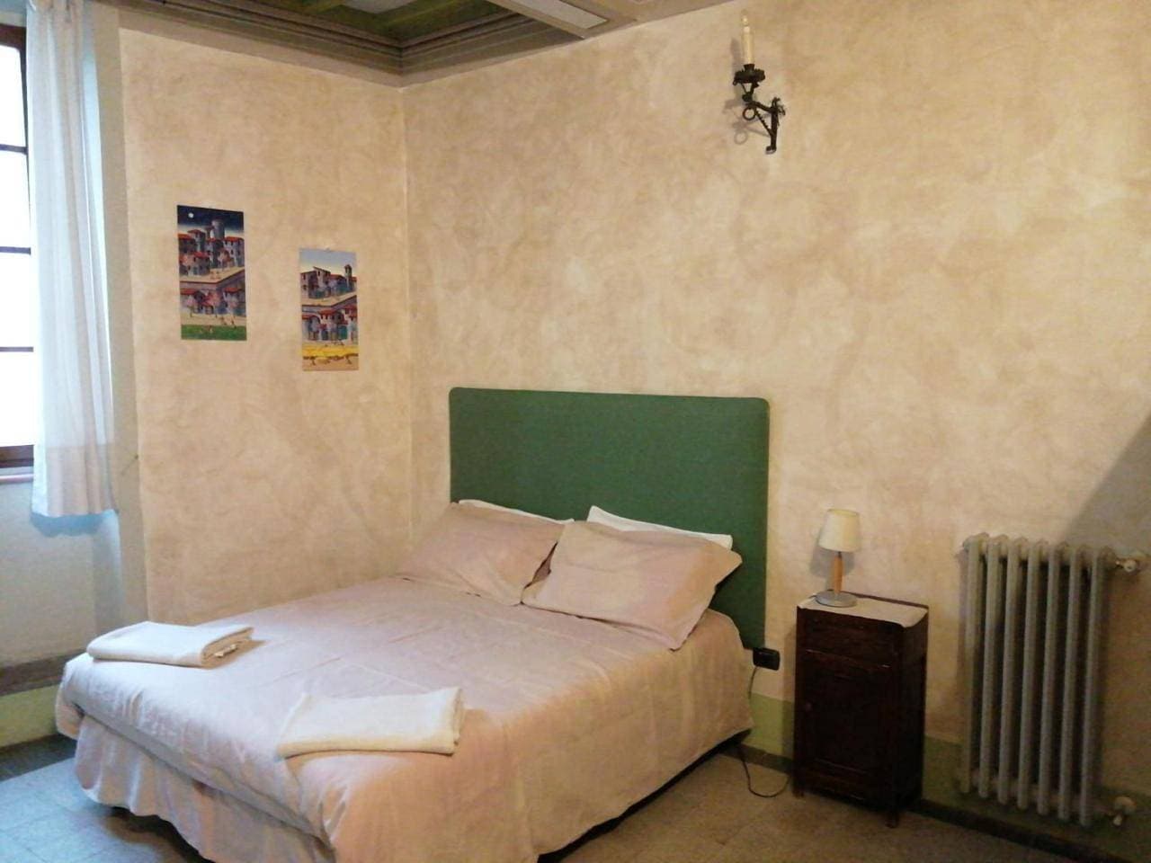 Foto 6 von 12: Triple Room with Private Bathroom